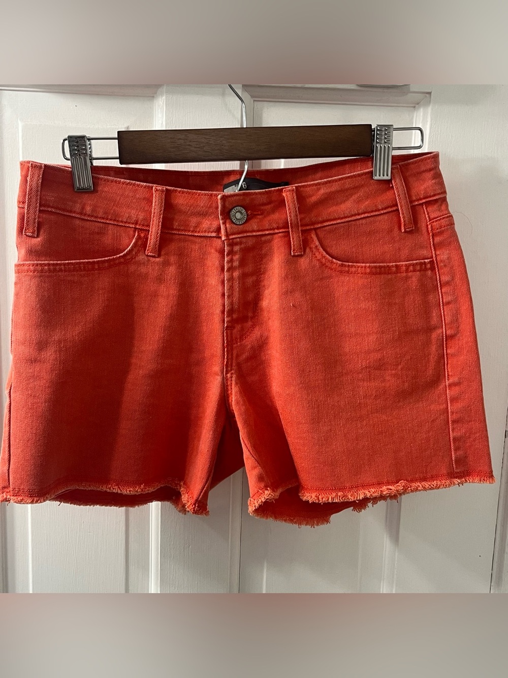 Levi's Women’s Orange Denim Cutoff Shorts. Size 6